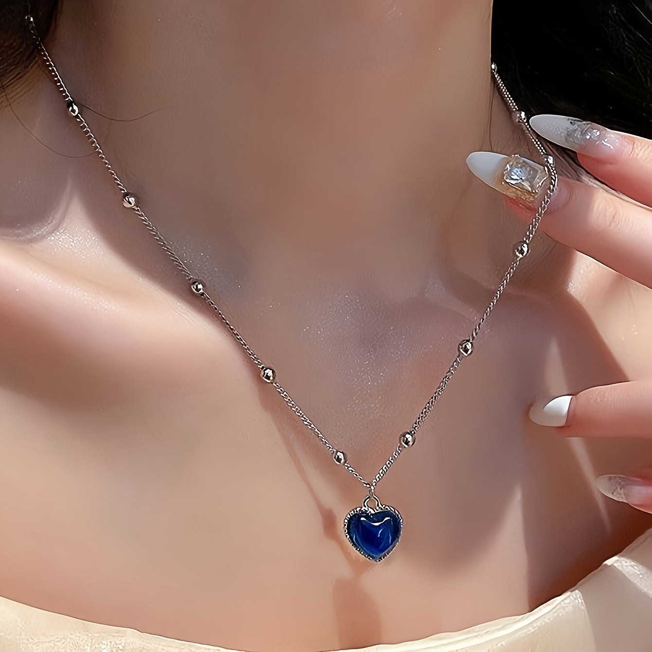 จี้สร้อยคอเปลี่ยนสีตามอุณหภูมิ - Body Jewelry Websites บทวิจารณ์และราคา